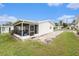 Charming home with a screened in porch with outdoor patio perfect for outdoor entertaining at 4325 93Rd N Ter, Pinellas Park, FL 33782