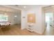 Inviting entryway with modern decor, hardwood floors, and views into the living and dining areas at 434 77Th Ave, St Pete Beach, FL 33706