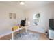 Bright office space with a standing desk, neutral decor, and ample natural light creating a productive atmosphere at 434 77Th Ave, St Pete Beach, FL 33706