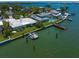 Waterfront property with boat dock and stunning water views from an aerial perspective at 4545 Clearwater Harbor N Dr, Largo, FL 33770