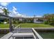 Charming backyard with scenic waterfront views from the backyard of this home at 4545 Clearwater Harbor N Dr, Largo, FL 33770