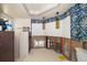 Bathroom with tile flooring and dramatic wallpaper ready for renovation at 4545 Clearwater Harbor N Dr, Largo, FL 33770