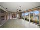 Bonus room with canal views, ready for remodel and features access to other living areas at 4545 Clearwater Harbor N Dr, Largo, FL 33770
