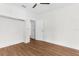 A simple room with vinyl wood flooring, neutral paint and a useful closet space at 459 Bell Ave, Brooksville, FL 34601