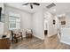 Bright bonus room with wood-look floors and ceiling fan at 4653 Ancona Way, Wesley Chapel, FL 33543