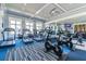 Well-lit gym featuring treadmills and stationary bikes at 4653 Ancona Way, Wesley Chapel, FL 33543