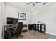 Comfortable office space with modern décor, wood floors, and ample natural light at 4653 Ancona Way, Wesley Chapel, FL 33543
