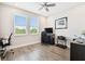 Office featuring natural light and wood flooring at 4653 Ancona Way, Wesley Chapel, FL 33543