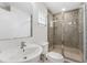 Bathroom with mosaic tiled shower and glass door at 5008 S Macdill Ave # 16, Tampa, FL 33611