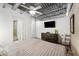 Comfortable main bedroom with a ceiling fan, large dresser, and a modern ensuite bathroom with glass shower at 5008 S Macdill Ave # 16, Tampa, FL 33611