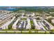 An aerial view shows several buildings with covered parking in this community at 5603 80Th N St # 103, St Petersburg, FL 33709