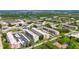 An aerial shot showing the lush landscaping and multiple buildings of the complex at 5603 80Th N St # 103, St Petersburg, FL 33709