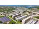 An aerial view shows several buildings with water views in this community at 5603 80Th N St # 103, St Petersburg, FL 33709