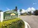 Entrance sign for Terrace Park of Five Towns, with lush landscaping at 5603 80Th N St # 103, St Petersburg, FL 33709