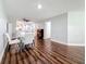 The dining room offers modern furnishings with wood floors at 5603 80Th N St # 103, St Petersburg, FL 33709