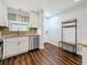 Updated kitchen with stainless steel appliances and gorgeous wood flooring at 5603 80Th N St # 103, St Petersburg, FL 33709