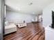 Open-concept living room with modern furnishings, seamlessly flowing from a seating area to the dining space at 5603 80Th N St # 103, St Petersburg, FL 33709
