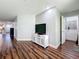 Open living area with modern furnishings and wood floors at 5603 80Th N St # 103, St Petersburg, FL 33709