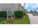 Exterior view of the Fordham building sign with landscaping and parked cars at 5603 80Th N St # 103, St Petersburg, FL 33709