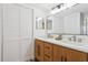 Bathroom featuring a double vanity and lots of space with a linen closet at 5633 Puerta Del Sol S Blvd # 204, St Petersburg, FL 33715
