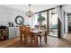 Charming dining area with stylish decor and access to the outdoor balcony at 5633 Puerta Del Sol S Blvd # 204, St Petersburg, FL 33715