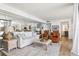 Bright and airy living room with neutral tones and comfortable seating at 5633 Puerta Del Sol S Blvd # 204, St Petersburg, FL 33715