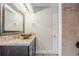 Modern bathroom vanity with vessel sink and tile accents near shower at 5847 Harrison St, New Port Richey, FL 34653