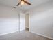 Bedroom featuring neutral carpet and a ceiling fan at 5847 Harrison St, New Port Richey, FL 34653