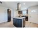 Well-equipped kitchen featuring a functional island, stainless appliances, and modern cabinetry at 5847 Harrison St, New Port Richey, FL 34653