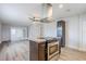 Spacious kitchen featuring a center island, stainless appliances, and open living space at 5847 Harrison St, New Port Richey, FL 34653