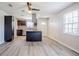 Bright kitchen with stainless steel appliances, central island, and stylish finishes at 5847 Harrison St, New Port Richey, FL 34653