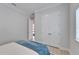Bedroom featuring a closet and access to other rooms at 5971 Hidden Branch Dr, Apollo Beach, FL 33572