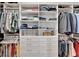 Organized walk-in closet with custom shelving, hanging racks, and drawers at 5971 Hidden Branch Dr, Apollo Beach, FL 33572