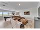Upstairs entertainment area features a comfortable couch and pool table at 5971 Hidden Branch Dr, Apollo Beach, FL 33572