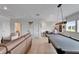 Upper level loft game room area with bar and entertainment options at 5971 Hidden Branch Dr, Apollo Beach, FL 33572