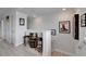 The upstairs loft area features a bar area and beautiful flooring at 5971 Hidden Branch Dr, Apollo Beach, FL 33572