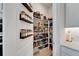 Well-organized pantry with shelving and storage solutions to maximize organization at 5971 Hidden Branch Dr, Apollo Beach, FL 33572