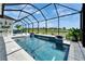 Stunning pool area with a screened enclosure, offering privacy and beautiful views of the lush surroundings at 5971 Hidden Branch Dr, Apollo Beach, FL 33572
