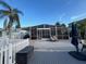 Spacious screened-in lanai with seating, offering seamless indoor-outdoor living and entertaining spaces at 6531 Seaview Blvd, Hudson, FL 34667