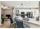 Bright kitchen featuring white cabinets, stainless steel appliances, and an island with counter seating at 6606 Pullen Ct, Tampa, FL 33625