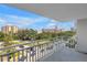 This balcony provides views of downtown buildings and a pleasant streetscape with mature trees at 700 Beach Ne Dr # 602, St Petersburg, FL 33701