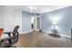 Spacious bedroom featuring plush carpeting, ample closet space, and a light fixture at 700 Beach Ne Dr # 602, St Petersburg, FL 33701