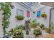 Charming interior courtyard adorned with lush greenery, perfect for relaxation at 700 Beach Ne Dr # 602, St Petersburg, FL 33701