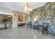 Comfortable lobby area with stone wall, seating, and artwork, creating a welcoming space at 700 Beach Ne Dr # 602, St Petersburg, FL 33701