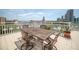 Spacious outdoor patio with dining table and stunning city views, perfect for entertaining at 700 Beach Ne Dr # 602, St Petersburg, FL 33701