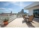 Comfortable outdoor terrace featuring lounge furniture and panoramic views of the city skyline at 700 Beach Ne Dr # 602, St Petersburg, FL 33701