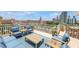 Relaxing rooftop terrace with plush seating, perfect for enjoying city vistas at 700 Beach Ne Dr # 602, St Petersburg, FL 33701