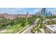 Charming street view showcases lush greenery, tropical palms and views of the Don CeSar Hotel at 700 Beach Ne Dr # 602, St Petersburg, FL 33701