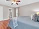 Primary bedroom with hardwood floors and an ensuite bathroom at 708 E Patterson St, Tampa, FL 33604