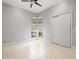 Cozy bedroom with large closet and corner windows offering great natural light and backyard views at 713 Argyle Pl, Temple Terrace, FL 33617